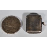 A silver hallmarked match vesta of plain form, Birmingham assay mark dating to 1912 with makers mark