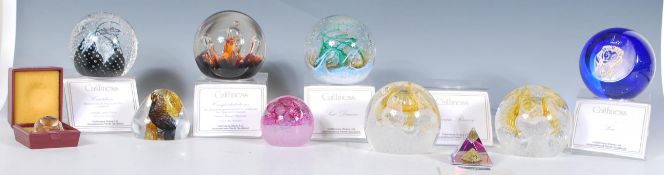 A collection of Caithness paperweights to include a selection of styles including control bubble and