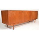 A mid century Danish teak wood sideboard believed to by Peter Lovig Nielsen for Dansk Designs,