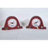 A pair of vintage 20th Century Industrial pressure meters by Roebuck, cast metal case having a red