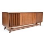 A stunning vintage retro 20th Century teak wood stereo radiogram by Packard Bell, louvre covers over