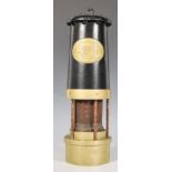 A late 19th / early 20th Century E Thomas & Williams Limited of Aberdare brass miner's lamp,