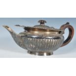 A high Victorian early 20th Century (1901) silver hallmarked decorative ornate teapot by