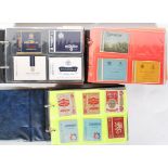 A collection of vintage 20th Century cigarette packets over three albums various brands to include