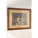A 19th Century framed and glazed family photographic picture of possibly a performing family, the