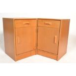 Stag - A pair of retro 20th Century light oak bedsides having a single drawer above a single door