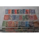 A collection of world stamps dating from the 19th Century. Mostly British pre decimal example to