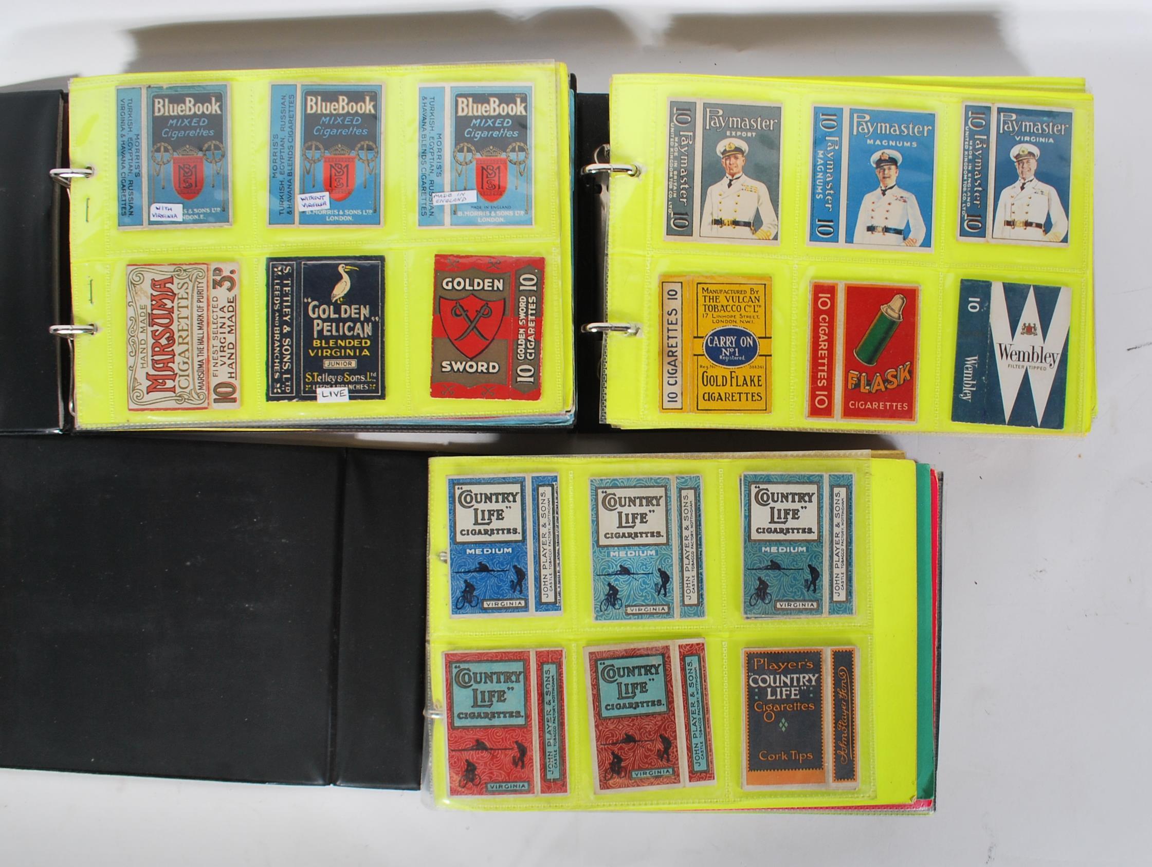A collection of vintage 20th Century Cigarette packets within plastic sleeves containing many