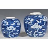 Two Chinese late 19th / early 20th Century blue and white Chinese ginger jars of bulbous form hand