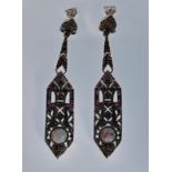 A pair of silver and marcasite Art Deco style drop earrings set opals and red stones. Stamped 925