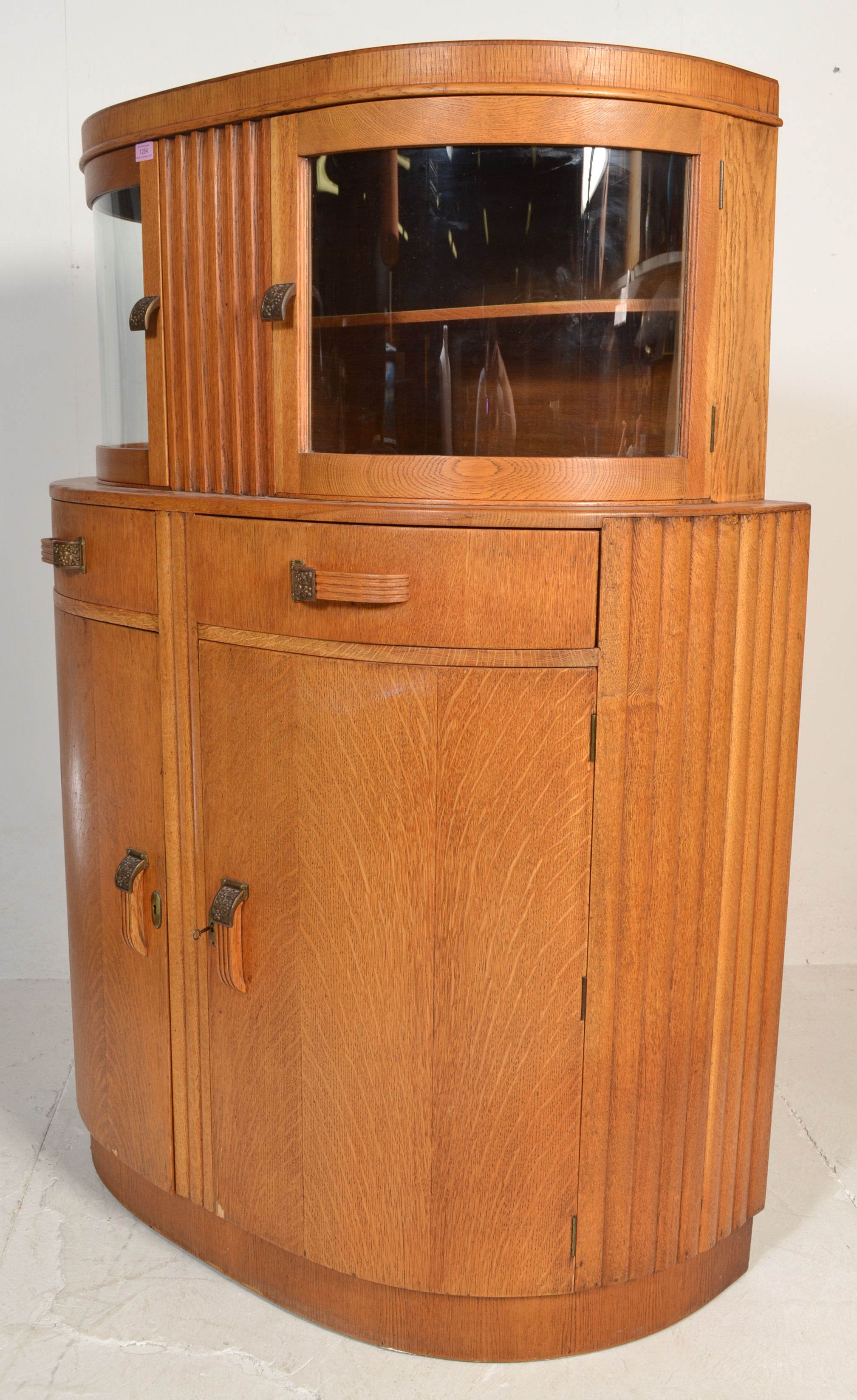 A 1930's Art Deco oak bow front sideboard / display cabinet. The twin bow front glass double door - Image 5 of 6