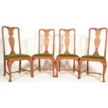 A set of 4 Edwardian golden oak Queen Anne high back dining chairs. Raised on cabriole legs with pad