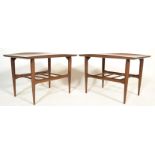 A pair of retro teak wood Danish inspired occasional side / coffee tables by Bassett Furniture