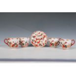 A set of four 20th Century Japanese Kutani export ware porcelain tea cups together with a saucer