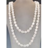 A 20th century opera length blister pearl necklace. Full length 46 inches long.