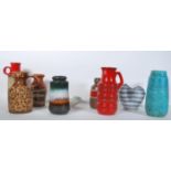A collection of West German vintage retro pottery vases of various forms to include a textured