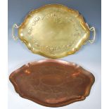 An Arts & Crafts oval copper twin handled copper tray by Joseph Sankey & Sons, with shaped rim and