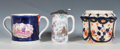 A group of 19th Century Victorian Staffordshire ceramics to include a Sunderland lustre loving cup