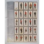 A collection of vintage Gallaher's British army cigarette cards, including a full set of 100 cards.