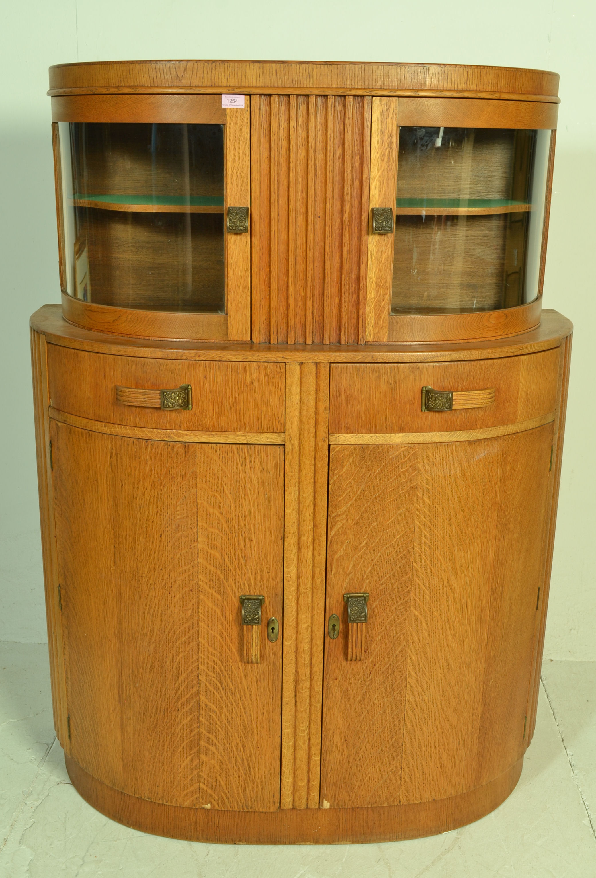 A 1930's Art Deco oak bow front sideboard / display cabinet. The twin bow front glass double door - Image 2 of 6