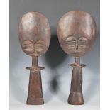 A pair of tribal African Ghanaian Ashanti Akua'Ba fertility doll figurines having typical low relief