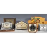 A collection of vintage 20th Century mantel clocks and travel clocks to include an Ingersol example,
