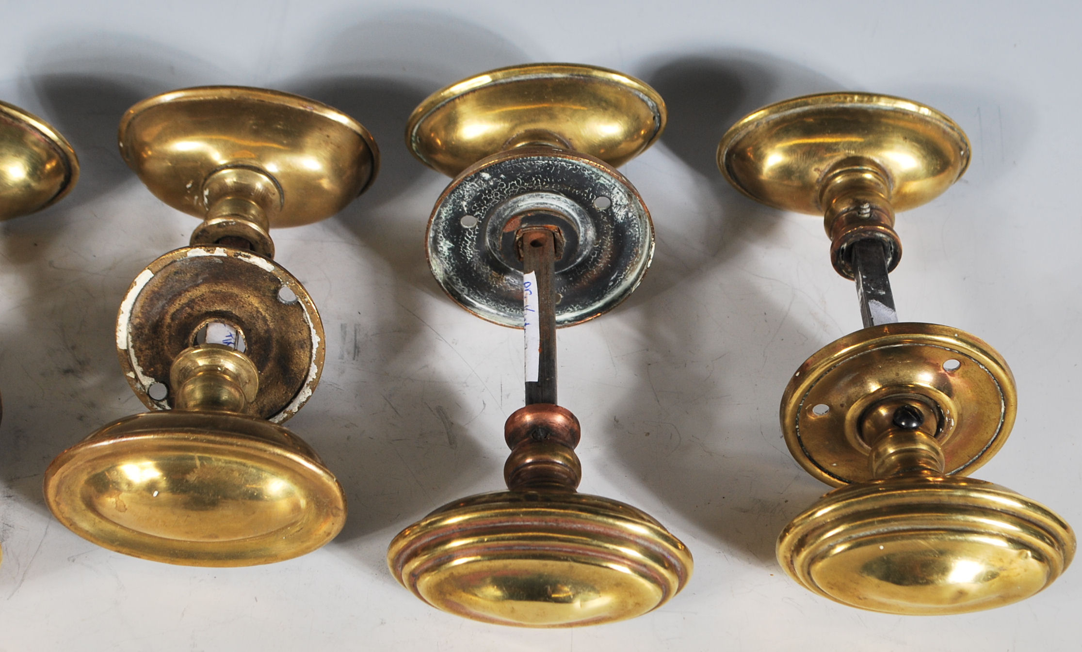 A group of five pairs of 19th Century Victorian brass door handles of oval stepped form. Each pair - Image 2 of 6
