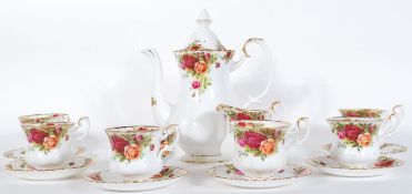 A Royal Albert Old Country Roses pattern coffee service comprising of coffee pot, six cups and