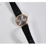 A vintage 9ct gold gentleman's Rotary wrist watch having a silvered dial with gilt baton numerals to