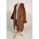 A group of eight vintage 20th Century ladies fur coats / jackets of differing styles and various