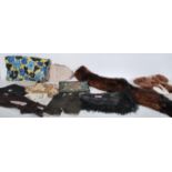 A collection of mid 20th Century clothing accessories to include a large selection of gloves