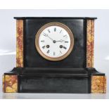 A 19th Century French Victorian slate mantel clock with a Japy Freres movement having a round