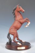A Royal Doulton ceramic horse figurine titled ' Spirit of the Wild ', the figurine modelled as a