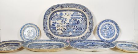 A collection of 19th Century Victorian blue and white transfer printed willow pattern meat