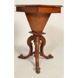 A 19th Century  Victorian walnut work box raised on tripod supports with scrolled feet, the box