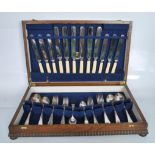 A 20th Century G Butler and Co stainless steel and silver plated cutlery service having ivorine