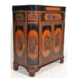 A mid century Chinese carved hardwood two tone cocktail drinks cabinet. Of Singapore origin having