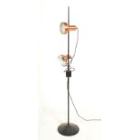 A retro 20th Century vintage floor standing standard lamp having twin copper colour spot lights on
