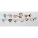 A selection of stamped 925 silver rings to include an oval turquoise cabochon ring, an oval cut