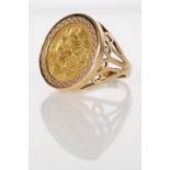 A hallmarked 9ct gold ring set with a 1905 Edward VII half sovereign, having a George and the Dragon
