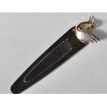 A silver hallmarked bookmark having a gilt swan finial with outstretched wings. Marked with import