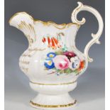 A mid 19th Century Victorian staffordshire presentational jug of reeded bulbous form raised on a