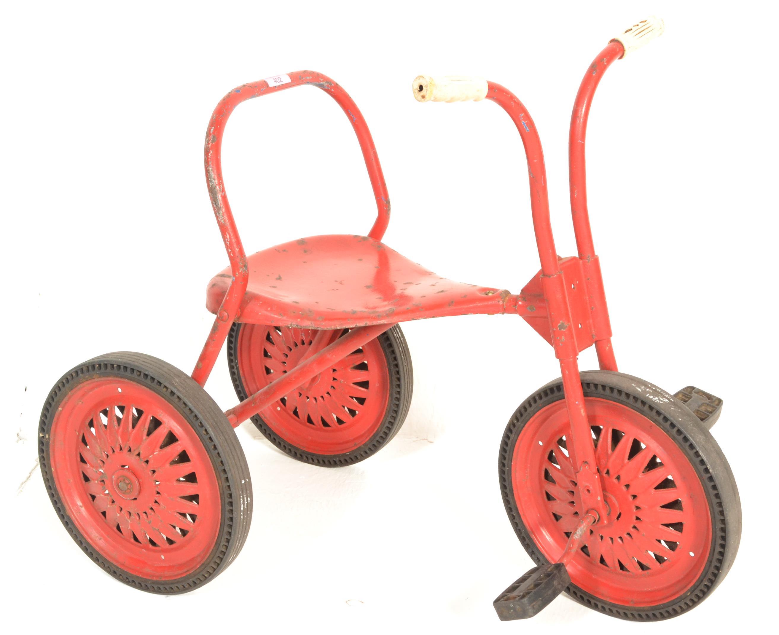 A VINTAGE TRI-ANG RIDE ALONG CHILD'S TRIKE WITH SOLID RUBBER TYRES