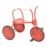 A VINTAGE TRI-ANG RIDE ALONG CHILD'S TRIKE WITH SOLID RUBBER TYRES