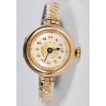 A vintage mid 20th Century 9ct gold cased wrist watch having a round face with arabic numerals to