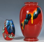 A Poole Pottery Delphis vase, possibly decorated by Cynthia Bennett, abstract pattern on orange /