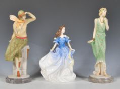 A group of three Royal Doulton ceramic figurines to include figure of the year 1998 Rebecca