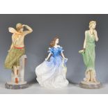 A group of three Royal Doulton ceramic figurines to include figure of the year 1998 Rebecca