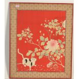 An early 20th century Burmese needlepoint on silk tapestry with cat and peony tree set on red silk