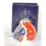 A Royal Crown Derby Robin paperweight with gold stamp to base, in good condition with original
